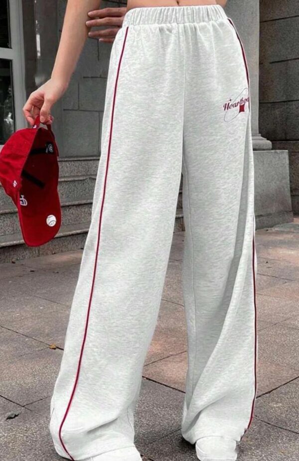 Roadster  The Lifestyle Co Printed Mid-Rise Loose Fit Parachute Trousers